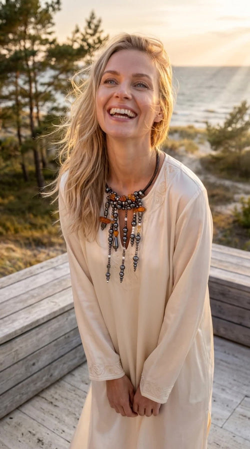 VEERA Amber Shadow necklace worn on model — hematite, amber, pearls and crystals