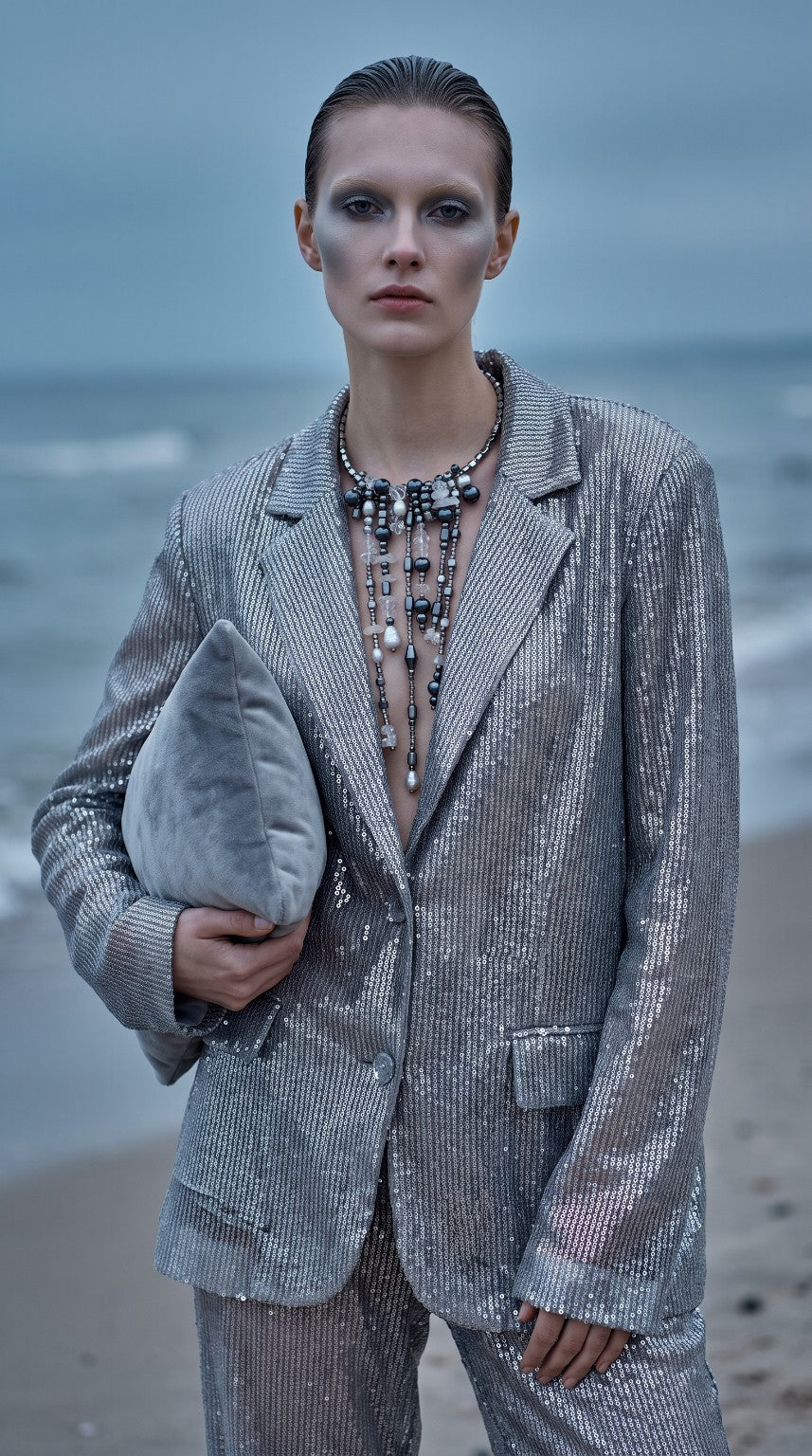 VEERA Northern Cascade statement necklace with hematite and grey pearls on model